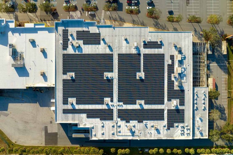 Network bets its own money on filling commercial roofs with solar and storing it in community batteries